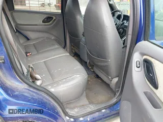 2006 Ford Escape XLT with VIN 1FMYU03146KB87070, listed as a IAAI auction lot 41451676 with 180,415 mi miles. Bid and sale history available at carsss.com. Image 8.