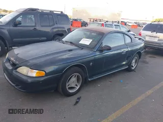 1998 Ford Mustang z VIN 1FAFP4041WF161422, wystawiony jako IAAI lot #42495413 z przebiegiem 207 906 mil mil oraz . Historia ofert i sprzedaży dostępna na DreamBid. Obrazek 2.