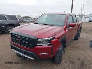 2023 Nissan Frontier Pro-4X z VIN 1N6ED1EK4PN652544, wystawiony jako IAAI lot #41309698 z przebiegiem 26 173 mil mil oraz . Historia ofert i sprzedaży dostępna na DreamBid. Obrazek 2.