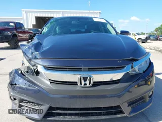 2016 Honda Civic Sedan EX-L with VIN 19XFC1F71GE041024, listed as a IAAI auction lot 41943073 with 59,833 mi miles. Bid and sale history available at carsss.com. Image 12.