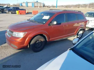 2012 Dodge Journey SE with VIN 3C4PDCAB8CT297188, listed as a IAAI auction lot 41661370 with 157,803 mi miles. Bid and sale history available at carsss.com. Image 2.