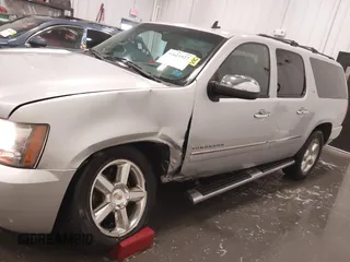 2011 Chevrolet Suburban LTZ with VIN 1GNSKKE31BR143238, listed as a IAAI auction lot 41621927 with 224,313 mi miles and . Bid and sale history available at DreamBid. Image 6.