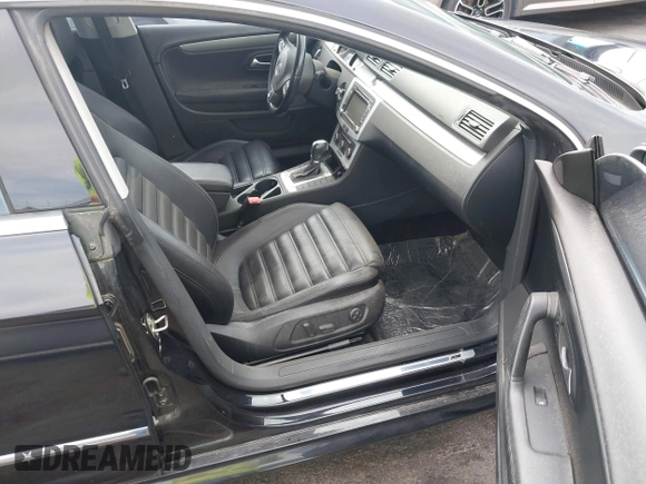 2012 Volkswagen CC R-Line with VIN WVWMP7AN9CE535769, listed as a IAAI auction lot 42409701 with 120,048 mi miles and . Bid and sale history available at DreamBid. Image 5.