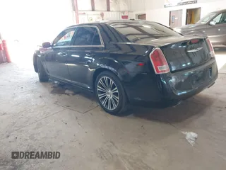 2013 Chrysler 300 with VIN 2C3CCABT1DH503835, listed as a IAAI auction lot 41303335 with 105,606 mi miles. Bid and sale history available at carsss.com. Image 3.