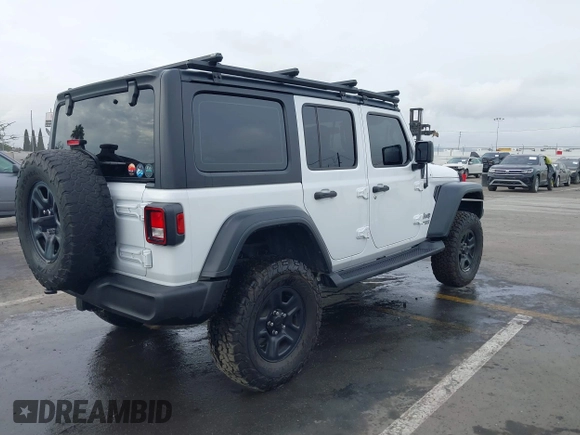 2018 Jeep Wrangler Unlimited Sport with VIN 1C4HJXDN0JW265823, listed as a IAAI auction lot 41707684 with 60,072 mi miles and . Bid and sale history available at DreamBid. Image 4.
