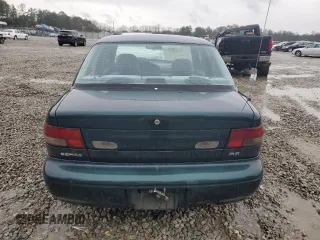 1996 Kia Sephia RS z VIN KNAFA1256T5265533, wystawiony jako Copart lot #48195555 z przebiegiem 225 062 mil mil oraz Szkody całkowita. Historia ofert i sprzedaży dostępna na DreamBid. Obrazek 6.