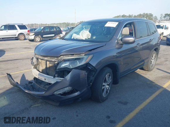 2017 Honda Pilot EX-L with VIN 5FNYF5H58HB011940, listed as a IAAI auction lot 41793151 with 118,088 mi miles. Bid and sale history available at carsss.com. Image 2.