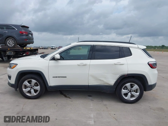 2019 Jeep Compass Latitude with VIN 3C4NJCBB9KT652088, listed as a IAAI auction lot 42162439 with 97,276 mi miles and . Bid and sale history available at DreamBid. Image 14.
