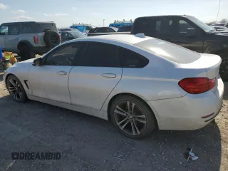 2015 BMW 4 Series 428i with VIN WBA4A5C5XFD410290, listed as a Copart auction lot 49067335 with 165,283 mi miles and Clean Title. Bid and sale history available at DreamBid. Image 2.