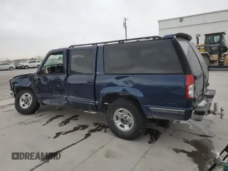 1999 GMC Suburban with VIN 1GDFK16R9XJ771458, listed as a Copart auction lot 43412175 with 159,328 mi miles and Salvage Title. Bid and sale history available at carsss.com. Image 2.