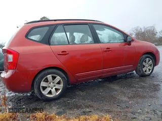 2007 Kia Rondo LX Base with VIN KNAFG525077087912, listed as a IAAI auction lot 41032154 with 109,141 mi miles. Bid and sale history available at carsss.com. Image 4.
