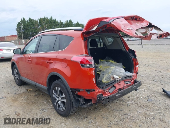 2016 Toyota RAV4 LE with VIN 2T3BFREV6GW516014, listed as a IAAI auction lot 41940997 with 74,129 mi miles. Bid and sale history available at carsss.com. Image 3.