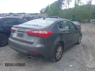 2014 Kia Forte EX with VIN KNAFX4A82E5086095, listed as a IAAI auction lot 42118745 with 151,040 mi miles. Bid and sale history available at carsss.com. Image 4.