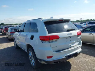 2014 Jeep Grand Cherokee Summit with VIN 1C4RJFJT3EC523129, listed as a IAAI auction lot 42341296 with 171,468 mi miles and . Bid and sale history available at DreamBid. Image 3.