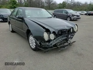 2001 Mercedes-Benz E-Class AWD with VIN WDBJF82J91X060969, listed as a Copart auction lot 71986544 with 113,694 mi miles and Salvage Title. Bid and sale history available at carsss.com. Image 10.
