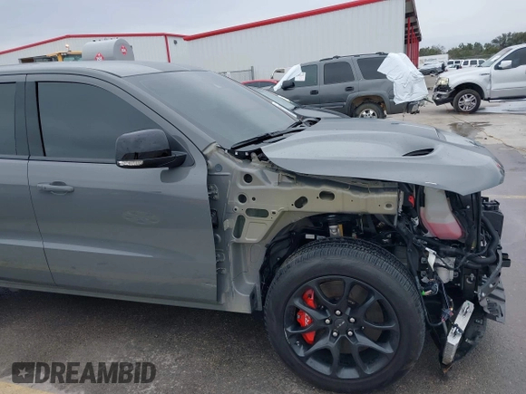 2021 Dodge Durango SRT Hellcat with VIN 1C4SDJH92MC605759, listed as a IAAI auction lot 41639174 with 4,800 mi miles and . Bid and sale history available at DreamBid. Image 18.
