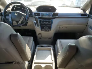 2012 Honda Odyssey EX-L with VIN 5FNRL5H69CB141594, listed as a Copart auction lot 55422115 with 181,745 mi miles and Salvage Title. Bid and sale history available at DreamBid. Image 8.