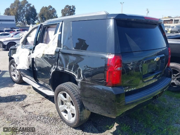 2015 Chevrolet Tahoe LT with VIN 1GNSCBKC6FR615554, listed as a IAAI auction lot 41572180 with 170,755 mi miles. Bid and sale history available at carsss.com. Image 3.