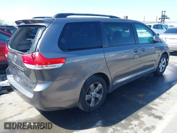 2012 Toyota Sienna LE AAS with VIN 5TDKK3DC9CS184722, listed as a IAAI auction lot 41942991 with 227,783 mi miles. Bid and sale history available at carsss.com. Image 4.