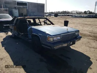 1988 Cadillac DeVille z VIN 1G6CD1156J4296091, wystawiony jako Copart lot #46307265 z przebiegiem Nie podano mil oraz Szkoda całkowita • Salvage title. Historia ofert i sprzedaży dostępna na DreamBid. Obrazek 11.