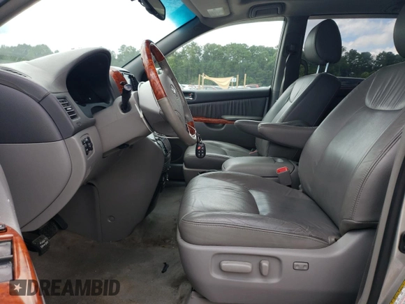 2010 Toyota Sienna XLE with VIN 5TDYK4CC5AS340124, listed as a Copart auction lot 66178854 with 99,485 mi miles and Salvage Title. Bid and sale history available at carsss.com. Image 7.