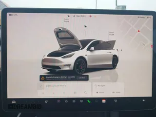 2022 Tesla Model Y Performance with VIN 7SAYGDEF0NF400560, listed as a IAAI auction lot 41783912 with 36,513 mi miles and . Bid and sale history available at DreamBid. Image 18.