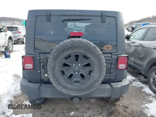 2017 Jeep Wrangler Unlimited Sport with VIN 1C4BJWDG1HL559261, listed as a IAAI auction lot 41367792 with 96,284 mi miles. Bid and sale history available at carsss.com. Image 16.