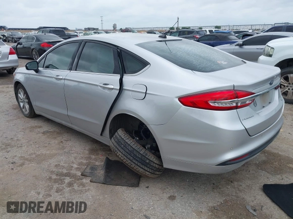2017 Ford Fusion SE with VIN 3FA6P0HD3HR273593, listed as a IAAI auction lot 42136079 with 101,545 mi miles and . Bid and sale history available at DreamBid. Image 3.