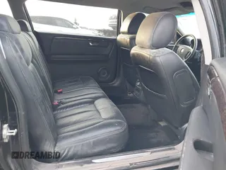 2009 Cadillac DTS Professional Limousine z VIN 1GEEK90Y69U550200, wystawiony jako IAAI lot #40908599 z przebiegiem 56 415 mil mil oraz . Historia ofert i sprzedaży dostępna na DreamBid. Obrazek 8.