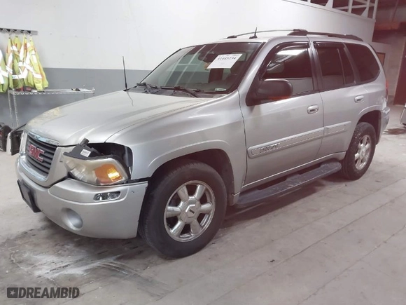 2004 GMC Envoy SLE with VIN 1GKDT13S842217581, listed as a IAAI auction lot 41445234 with 170,310 mi miles. Bid and sale history available at carsss.com. Image 2.