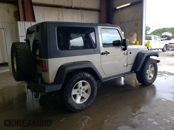 2007 Jeep Wrangler Rubicon z VIN 1J8GA64117L187431, wystawiony jako Copart lot #61293624 z przebiegiem 263 459 mil mil oraz Szkoda całkowita • Salvage title. Historia ofert i sprzedaży dostępna na DreamBid. Obrazek 3.