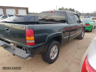 2002 Chevrolet Silverado 1500 LS with VIN 1GCEK19TX2E298985, listed as a IAAI auction lot 41459560 with 123,180 mi miles. Bid and sale history available at carsss.com. Image 4.