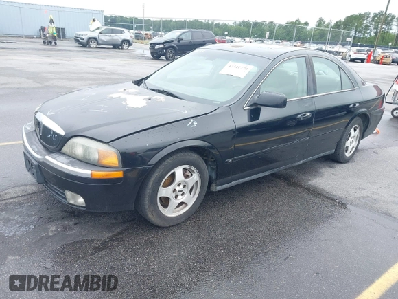 2001 Lincoln LS w/Base Pkg z VIN 1LNHM87A11Y601193, wystawiony jako IAAI lot #42341770 z przebiegiem 187 845 mil mil oraz . Historia ofert i sprzedaży dostępna na DreamBid. Obrazek 2.