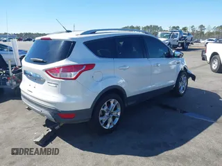 2015 Ford Escape Titanium with VIN 1FMCU0J94FUA69088, listed as a IAAI auction lot 41810406 with 167,749 mi miles. Bid and sale history available at carsss.com. Image 4.