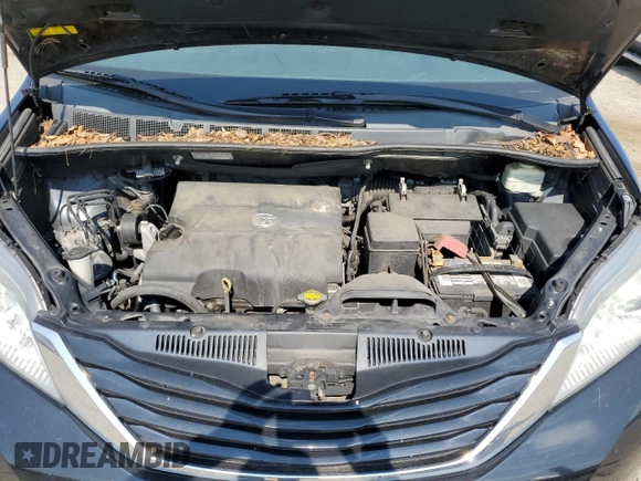 2015 Toyota Sienna LE AAS with VIN 5TDKK3DC7FS686021, listed as a Copart auction lot 66761315 with 241,779 mi miles and Clean title. Bid and sale history available at DreamBid. Image 12.