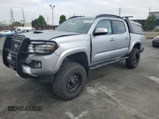 2020 Toyota Tacoma SR5 with VIN 3TMAZ5CN3LM125879, listed as a Copart auction lot 58379355 with 46,521 mi miles and Salvage title. Bid and sale history available at DreamBid. Image 1.