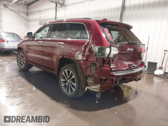 2018 Jeep Grand Cherokee High Altitude with VIN 1C4RJFCG6JC215902, listed as a IAAI auction lot 41866716 with 76,282 mi miles. Bid and sale history available at carsss.com. Image 3.