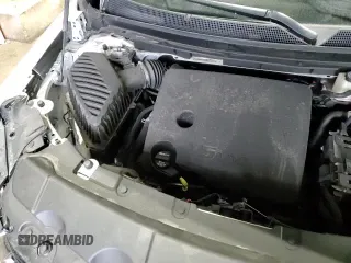 2022 Chevrolet Traverse Premier with VIN 1GNEVKKW7NJ183927, listed as a Copart auction lot 57265825 with 54,472 mi miles and Salvage title. Bid and sale history available at DreamBid. Image 16.