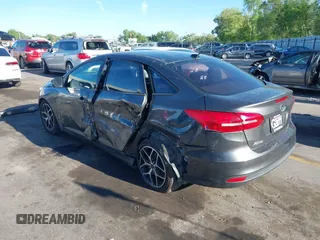 2018 Ford Focus SE with VIN 1FADP3FE0JL270966, listed as a IAAI auction lot 42206548 with 89,067 mi miles and . Bid and sale history available at DreamBid. Image 3.