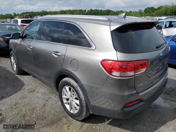 2016 Kia Sorento LX with VIN 5XYPG4A37GG035701, listed as a Copart auction lot 52656154 with 148,564 mi miles and Salvage Title. Bid and sale history available at carsss.com. Image 2.