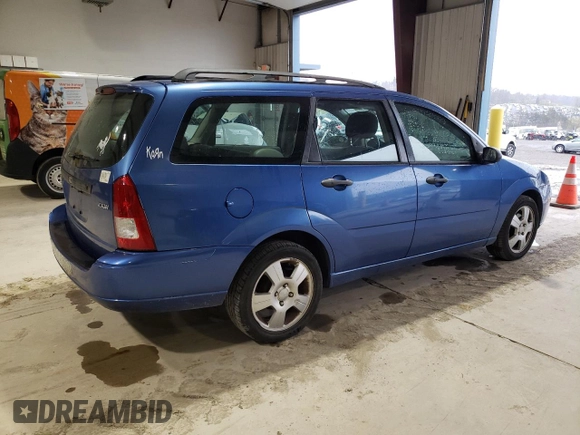 2005 Ford Focus SE with VIN 1FAHP36N65W187161, listed as a Copart auction lot 52024045 with 261,194 mi miles and Salvage Title. Bid and sale history available at carsss.com. Image 3.
