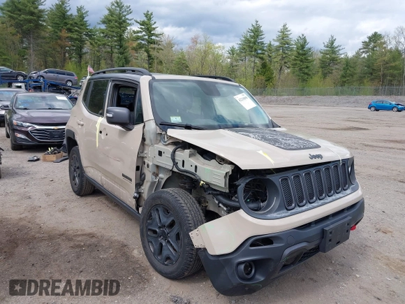 2017 Jeep Renegade Trailhawk z VIN ZACCJBCB8HPE88509, wystawiony jako IAAI lot #42210098 z przebiegiem 114 832 mil mil oraz . Historia ofert i sprzedaży dostępna na DreamBid. Obrazek 1.