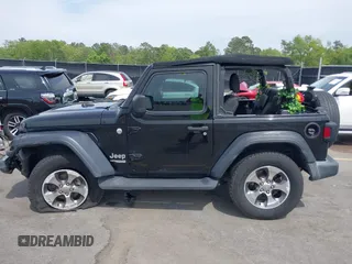 2018 Jeep Wrangler Sport S with VIN 1C4GJXAN8JW290064, listed as a IAAI auction lot 42012484 with 93,838 mi miles and . Bid and sale history available at DreamBid. Image 14.