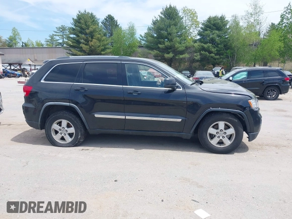 2011 Jeep Grand Cherokee Laredo z VIN 1J4RR4GG0BC547689, wystawiony jako IAAI lot #42230005 z przebiegiem 192 361 mil mil oraz . Historia ofert i sprzedaży dostępna na DreamBid. Obrazek 13.