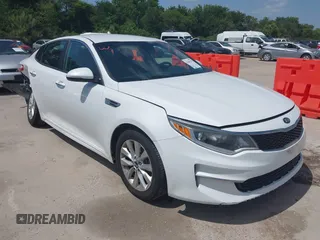 2017 Kia Optima LX z VIN 5XXGT4L31HG139082, wystawiony jako IAAI lot #42449379 z przebiegiem 115 552 mil mil oraz . Historia ofert i sprzedaży dostępna na DreamBid. Obrazek 1.