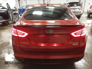 2014 Ford Fusion Titanium with VIN 3FA6P0K97ER324027, listed as a IAAI auction lot 41327141 with 161,045 mi miles and . Bid and sale history available at DreamBid. Image 16.