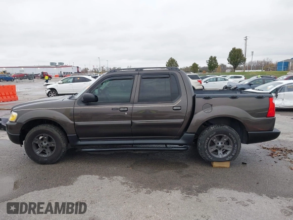 2005 Ford Explorer Sport Trac XLS z VIN 1FMZU77K05UB13891, wystawiony jako IAAI lot #40859877 z przebiegiem 157 308 mil mil oraz . Historia ofert i sprzedaży dostępna na DreamBid. Obrazek 14.