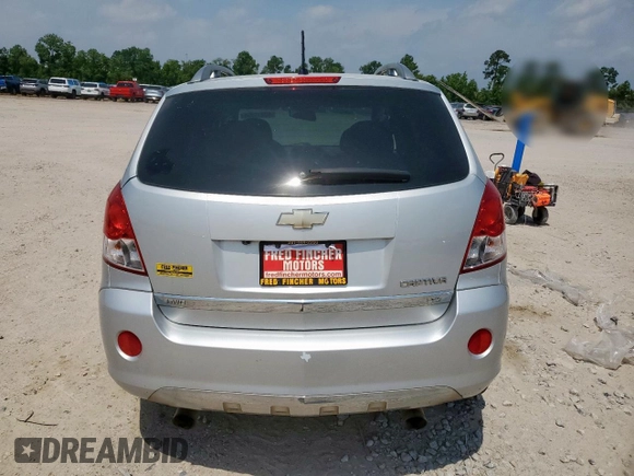 2012 Chevrolet Captiva Sport LTZ z VIN 3GNFL4E51CS522752, wystawiony jako Copart lot #57215795 z przebiegiem 123 522 mil mil oraz Szkoda całkowita • Salvage title. Historia ofert i sprzedaży dostępna na DreamBid. Obrazek 6.