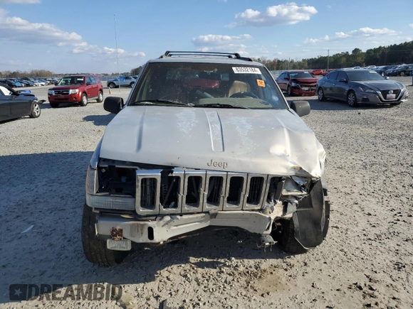 1998 Jeep Grand Cherokee with VIN 1J4GX48Y7WC216585, listed as a Copart auction lot 83532184 with 144,739 mi miles and Salvage title. Bid and sale history available at DreamBid. Image 5.