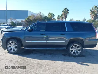 2019 Cadillac Escalade ESV Luxury z VIN 1GYS4HKJ0KR217932, wystawiony jako IAAI lot #41446166 z przebiegiem 86 404 mil mil oraz . Historia ofert i sprzedaży dostępna na DreamBid. Obrazek 14.